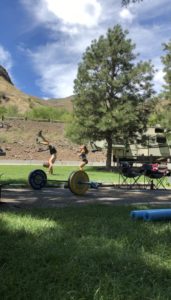 Emily and Joe doing a fun campground crossfit workout