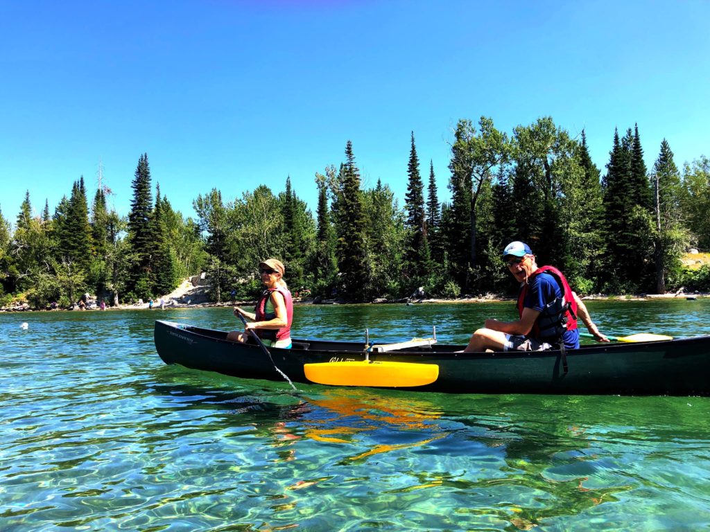 Sue and Chuck canoeing at Jenny Lake