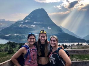 Jacky, Emily, and Stacy in Glacier NP with mountain