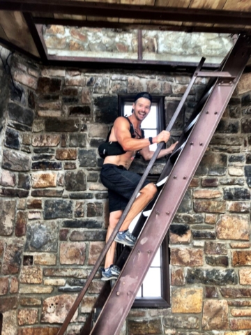 Joe climbing up Harney Peak Lookout stairs