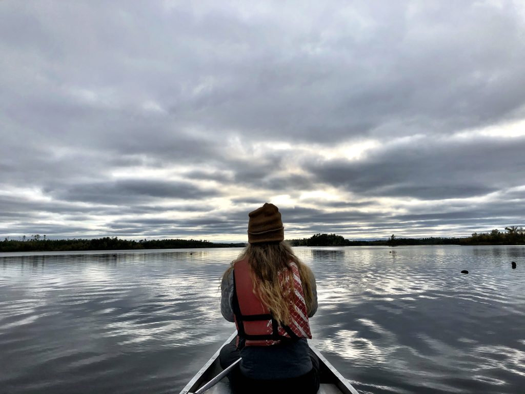 Emily and the view at Fall Lake in the Boundary Waters