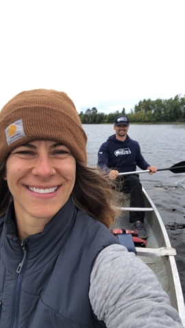 Emily and Joe canoeing On the Boundary Waters of Fall Lake