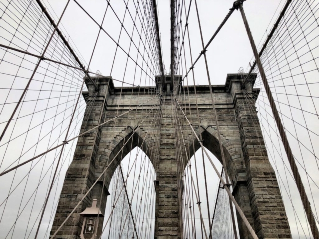 Brooklyn Bridge cables with gray sky