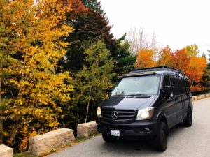 Sportsmobile Van and fall colors in Park