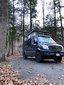 Sprinter Van with pop top in campground