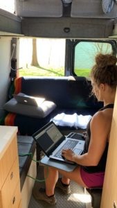 Emily working from the road in our Mercedes Sprinter Van