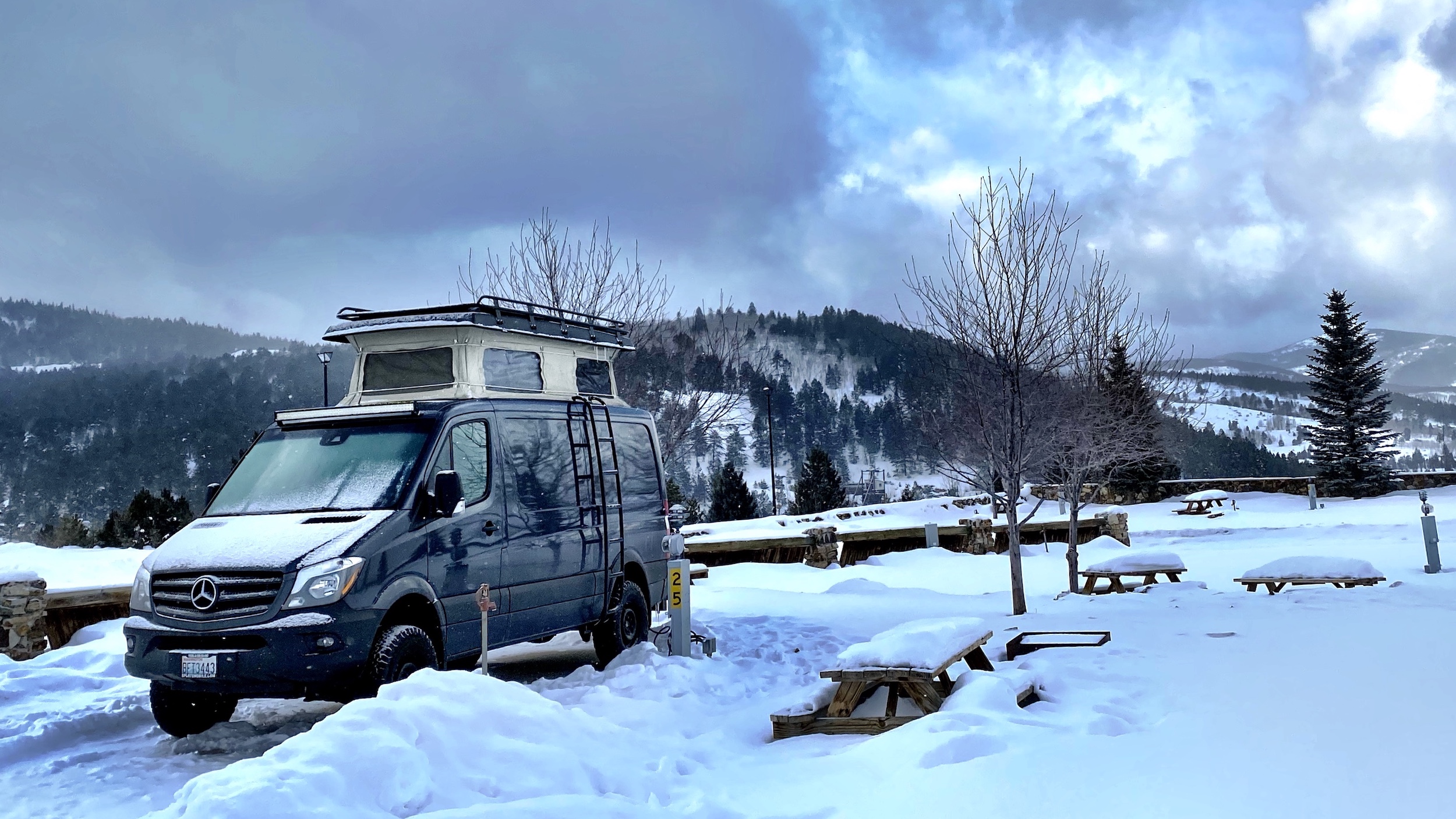 RV Camping Near IKON Pass Ski Resorts at a snowy KOA in Colorado in our Sprinter Van