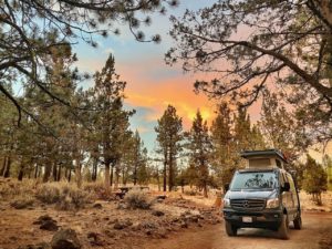 Camping location outside of Susanville CA with amazing orange sunset in the mercedes sprinter van pop top