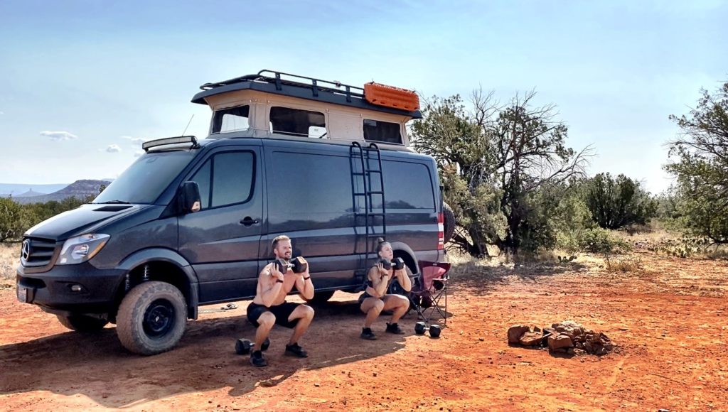 Joe and Emily working out in front of the sprinter van in Sedona AZ