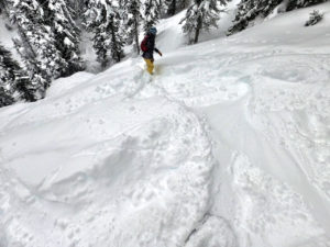 Emily snowboarding in Jackson Hole powder
