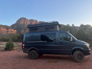 Sprinter van with pop top camping near Wire Rim Trail