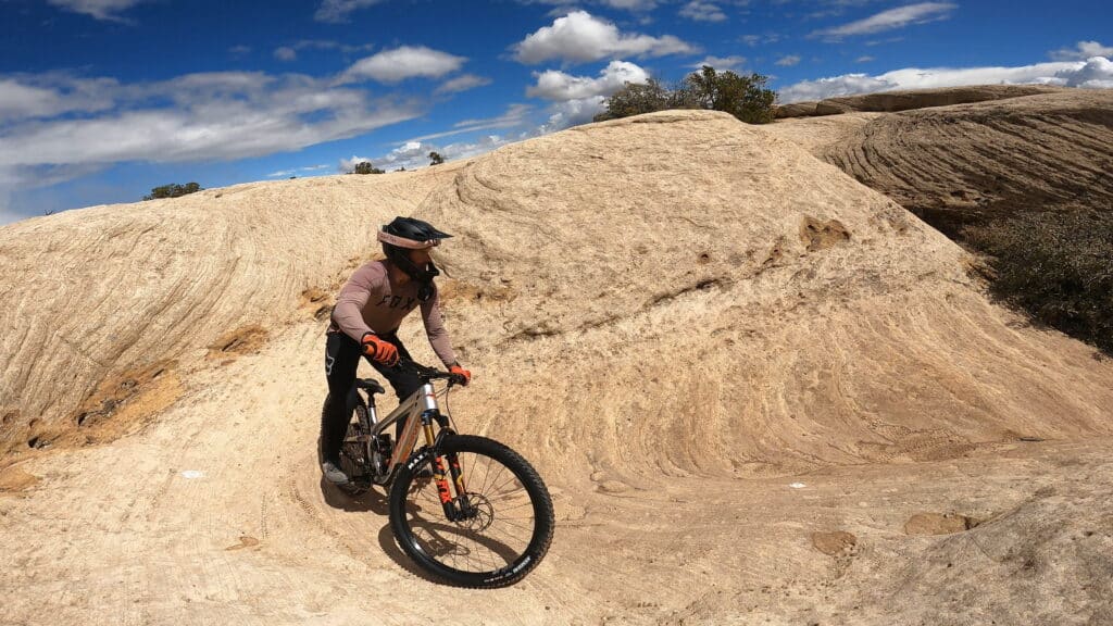 Riding Pivot Firebird on Utah red rocks at Gooseberry Mesa