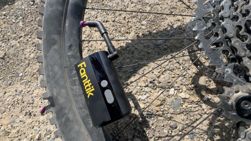 Fanttik X9 tire pump on bike tire