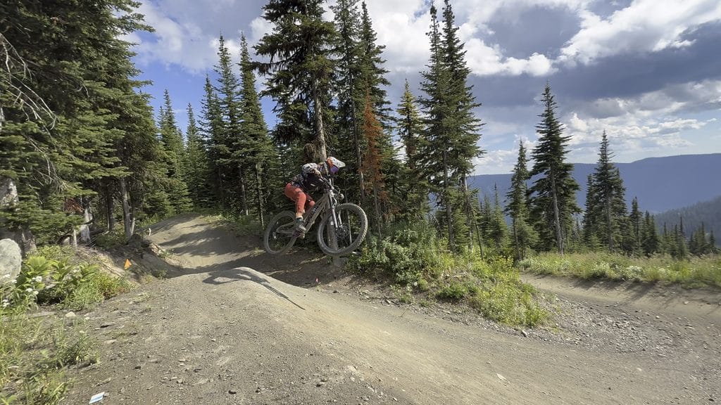 Emily hitting jump on Stella Blue at Sun Peaks